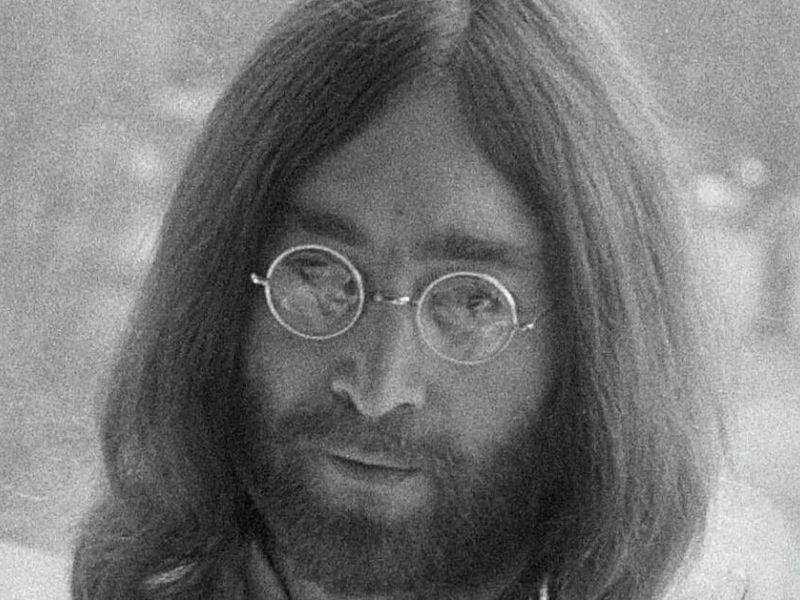 Black and white photo of John Lennon
