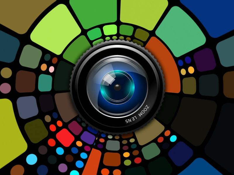 Illustration of a cameral lens surrounded by blocks of colour