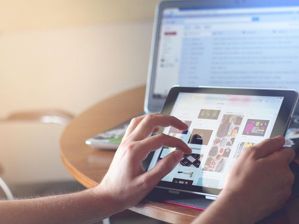 Photo of browsing on a tablet with adverts