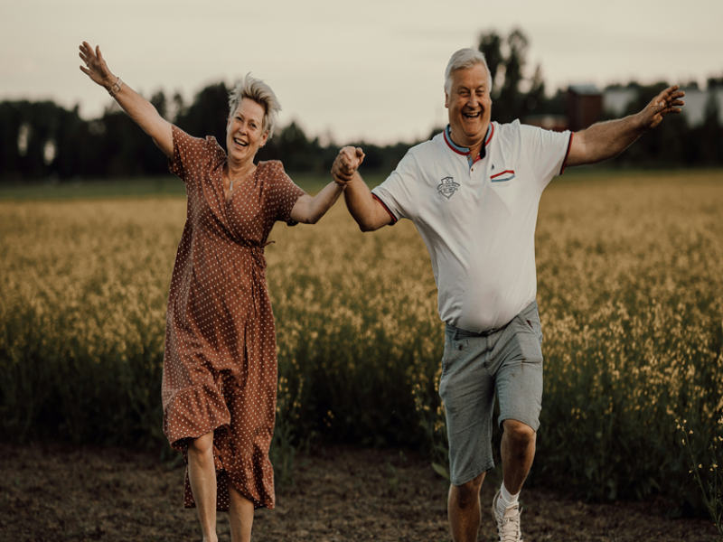 A man and woman jumping in the air by Isak Pettersson (@isakpetterssonfoto)