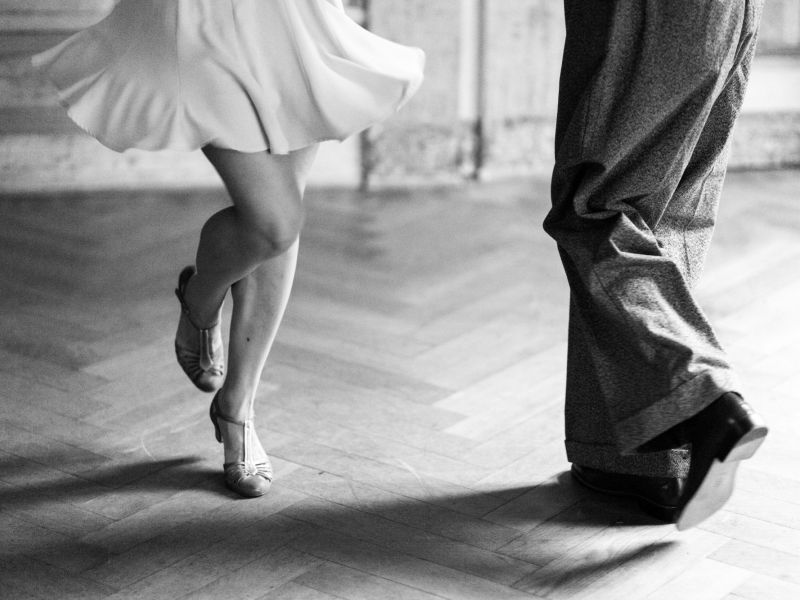 people smiling playing cards