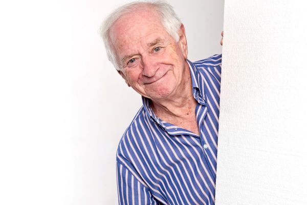 people smiling playing cards