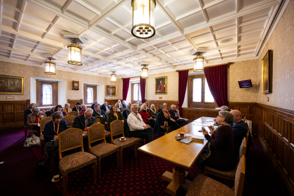 An audience faces a panel of House of Lords members