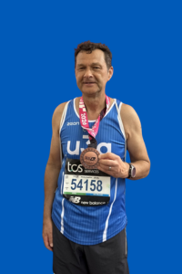 Clive, after completing the London Marathon