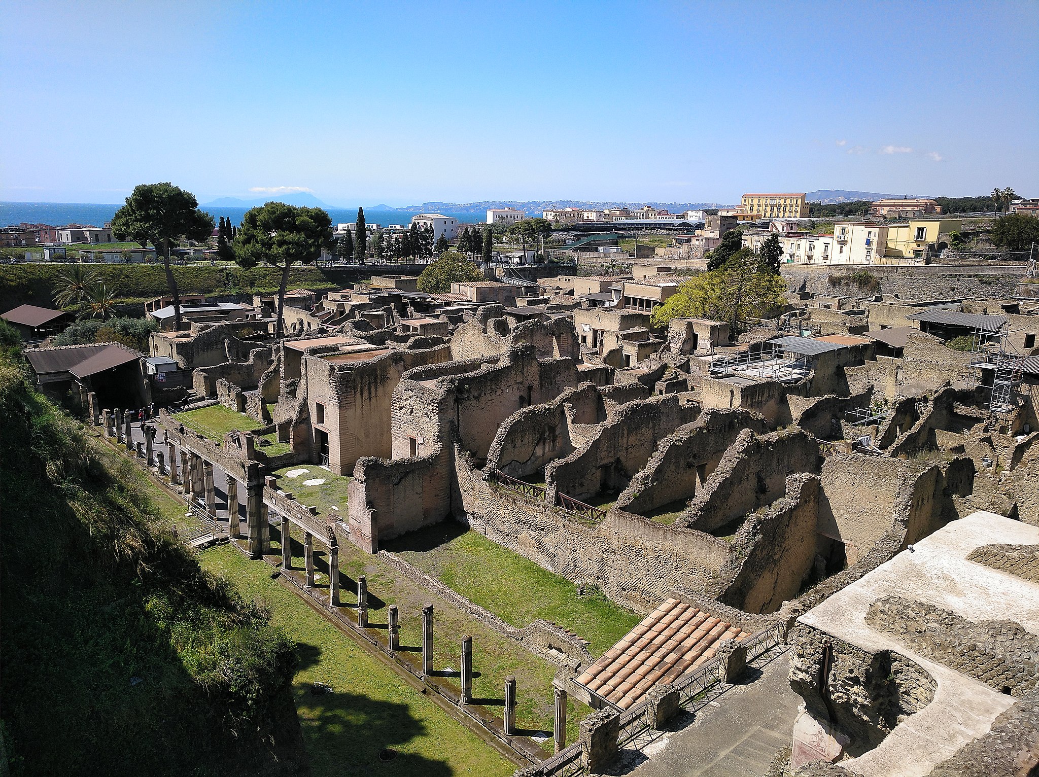 a view of roman ruins. it's a sunny day. 