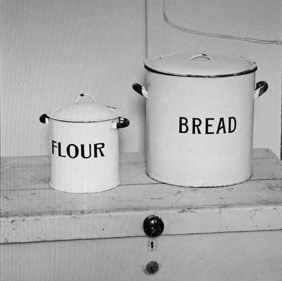 Vintage flour and bread tins