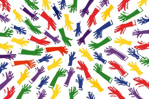 Graphic of coloured hands reaching to a centre.