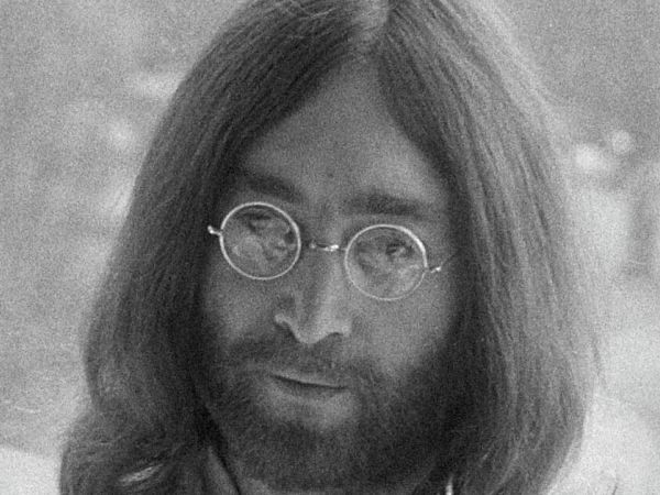 Black and white photo of John Lennon
