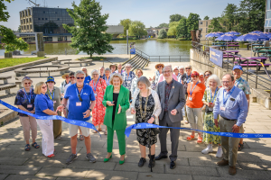 Diana Moran, Allan Walmsley and Margaret Fiddes are among those cutting the ribbon officially opening u3a Festival 24