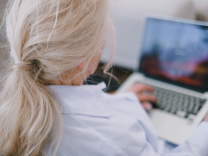 A woman learns on her laptop