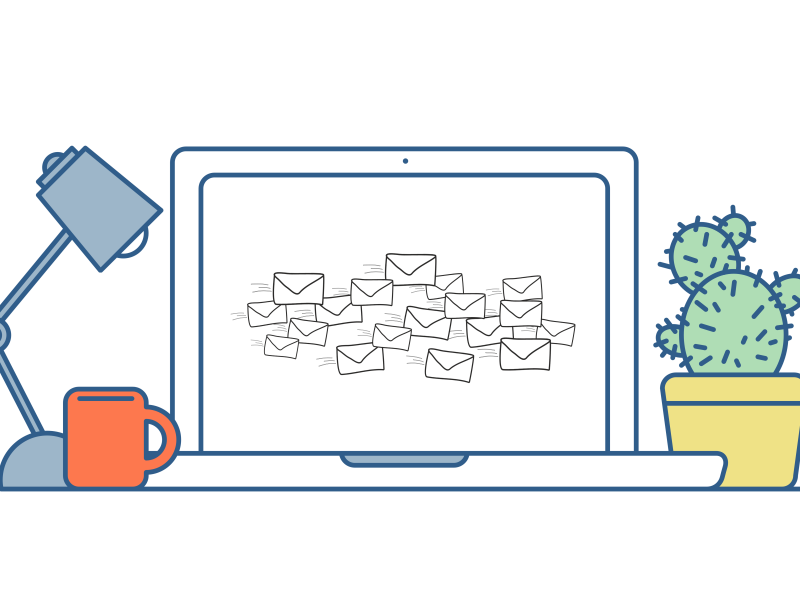 laptop with email envelopes on screen with a cactus, mug and lamp next to it