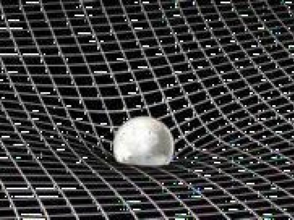 black and white graphic showing gravity on a silver ball 