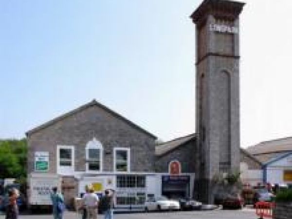 grey stone buidling with tall stone tower attached
