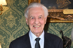 Eric Midwinter smiling at the camera