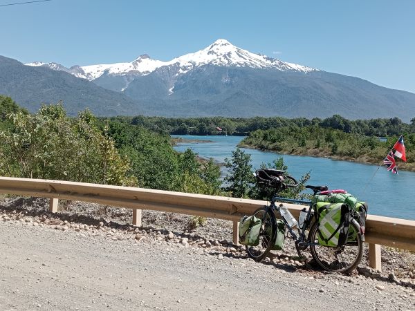 Bike on a road overlooking a river in Chile