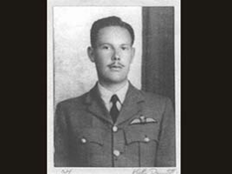 black and white photo of a man in uniform