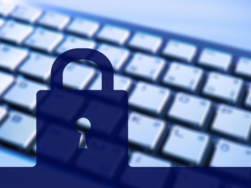 A secure padlock over a keyboard