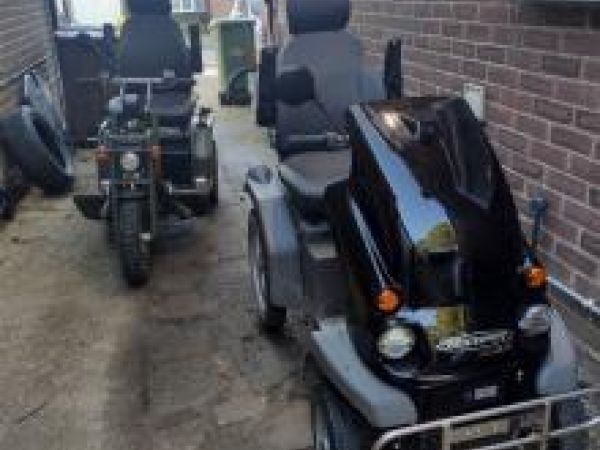 two mobility scooters