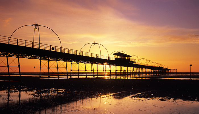 Silhouette of a pier at sunset