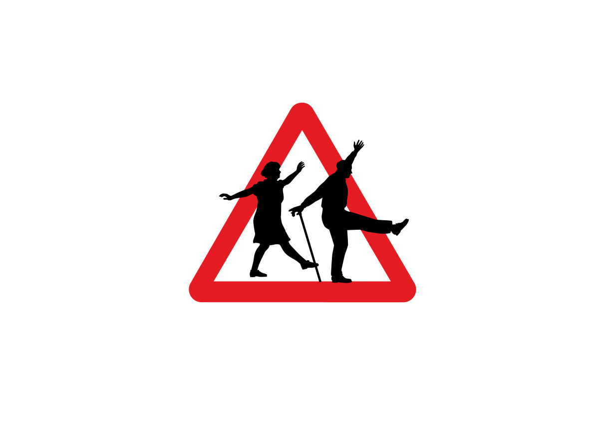 Three older people walking together interlinking arms, with billboard of footballers behind them