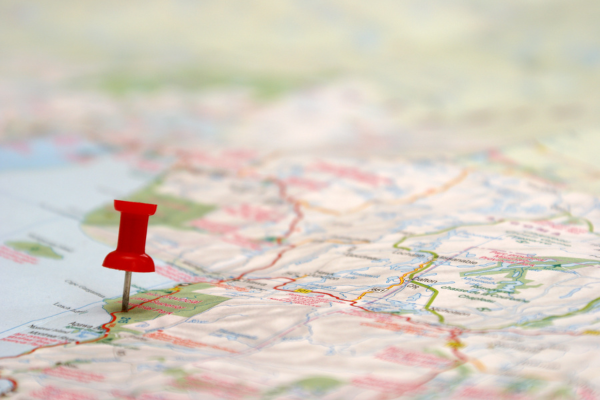 a red pushpin on a map