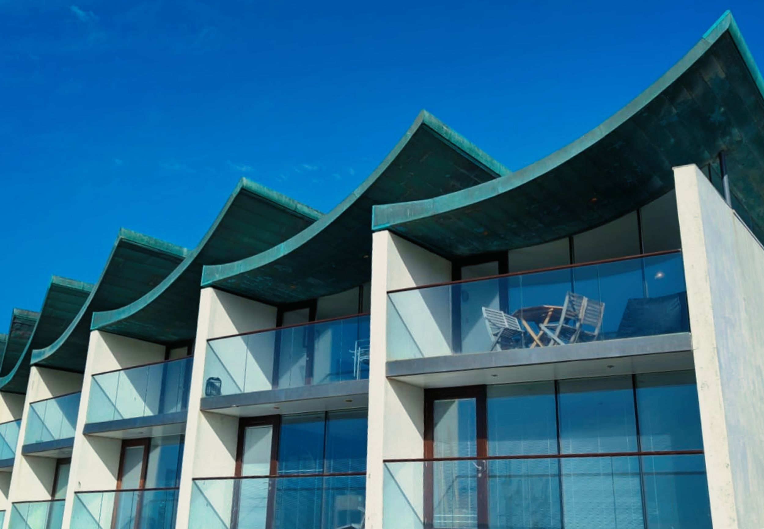 Photo of apartments with overlapping roofs