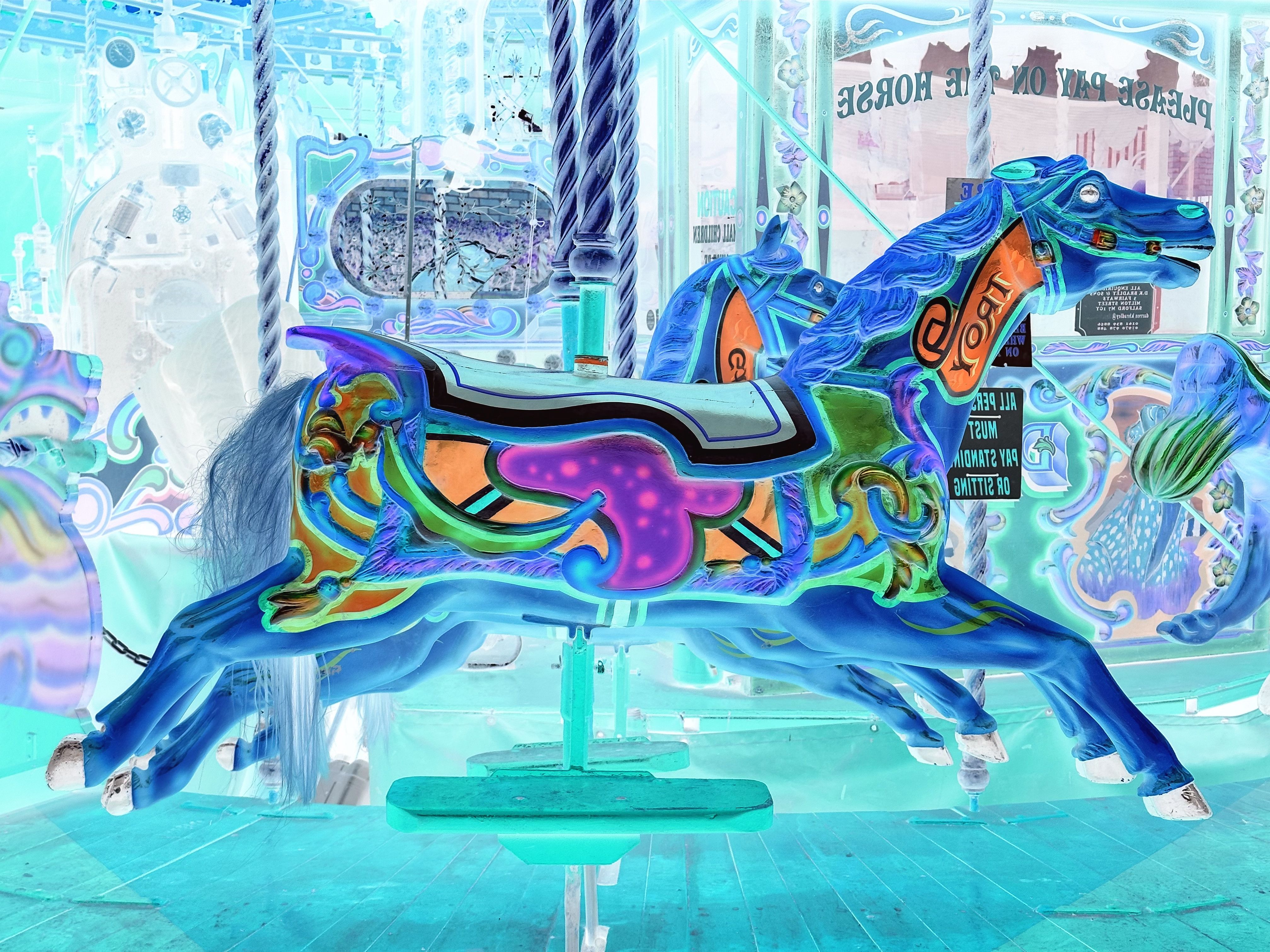 Photo of fairground horse in negative and reversed