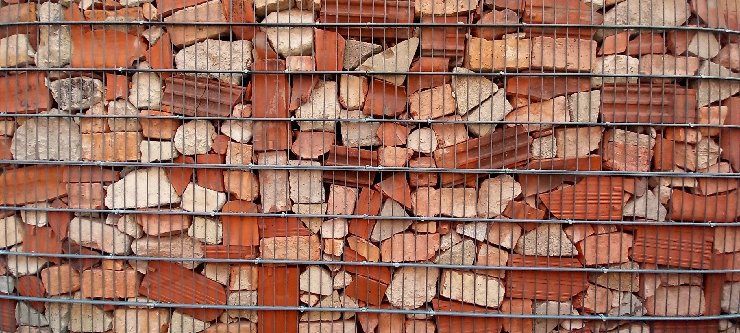 Photo of a brick fragments making a wall