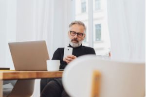 Man reading something on his phone