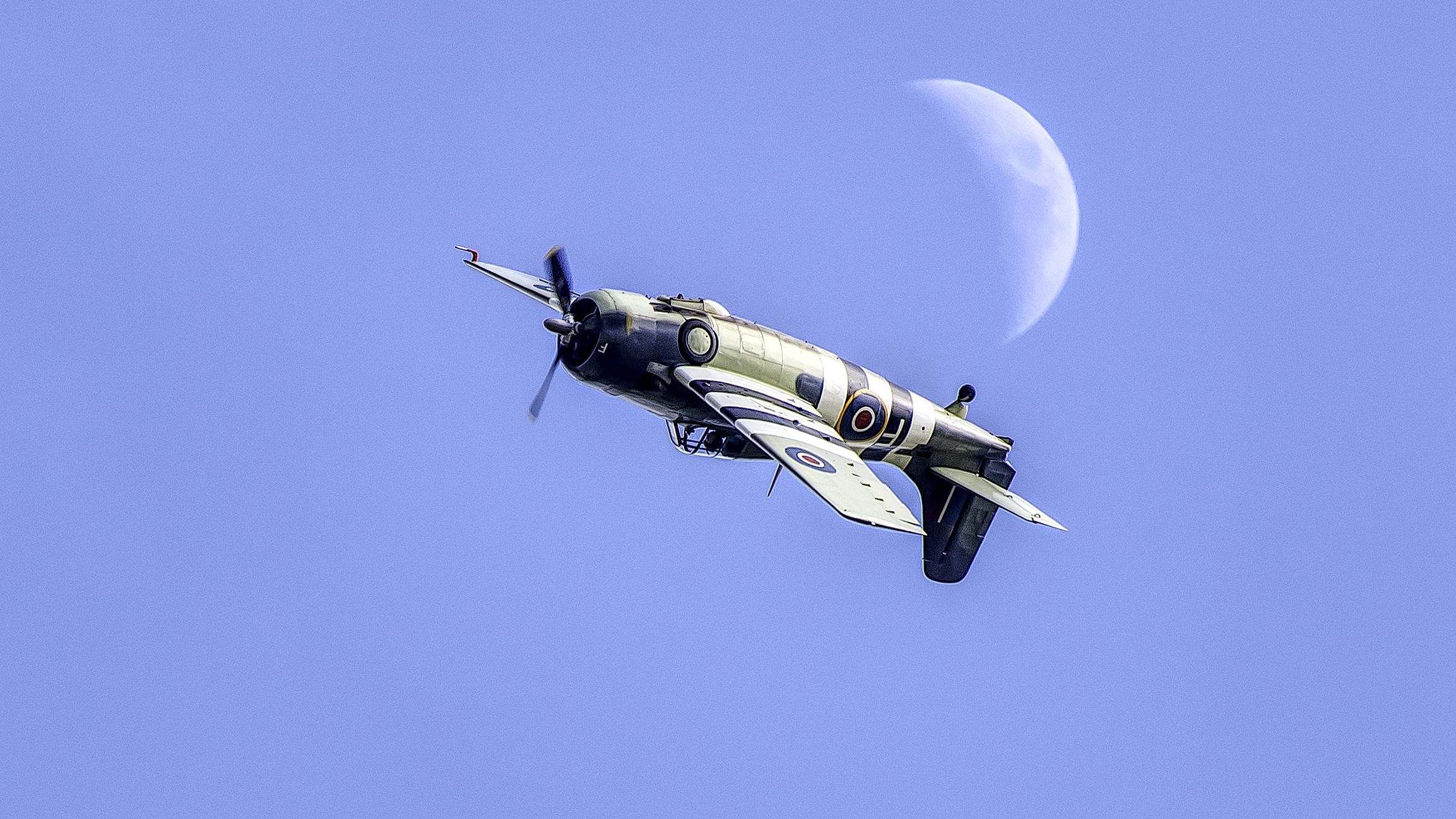 Photo of an upside down plane